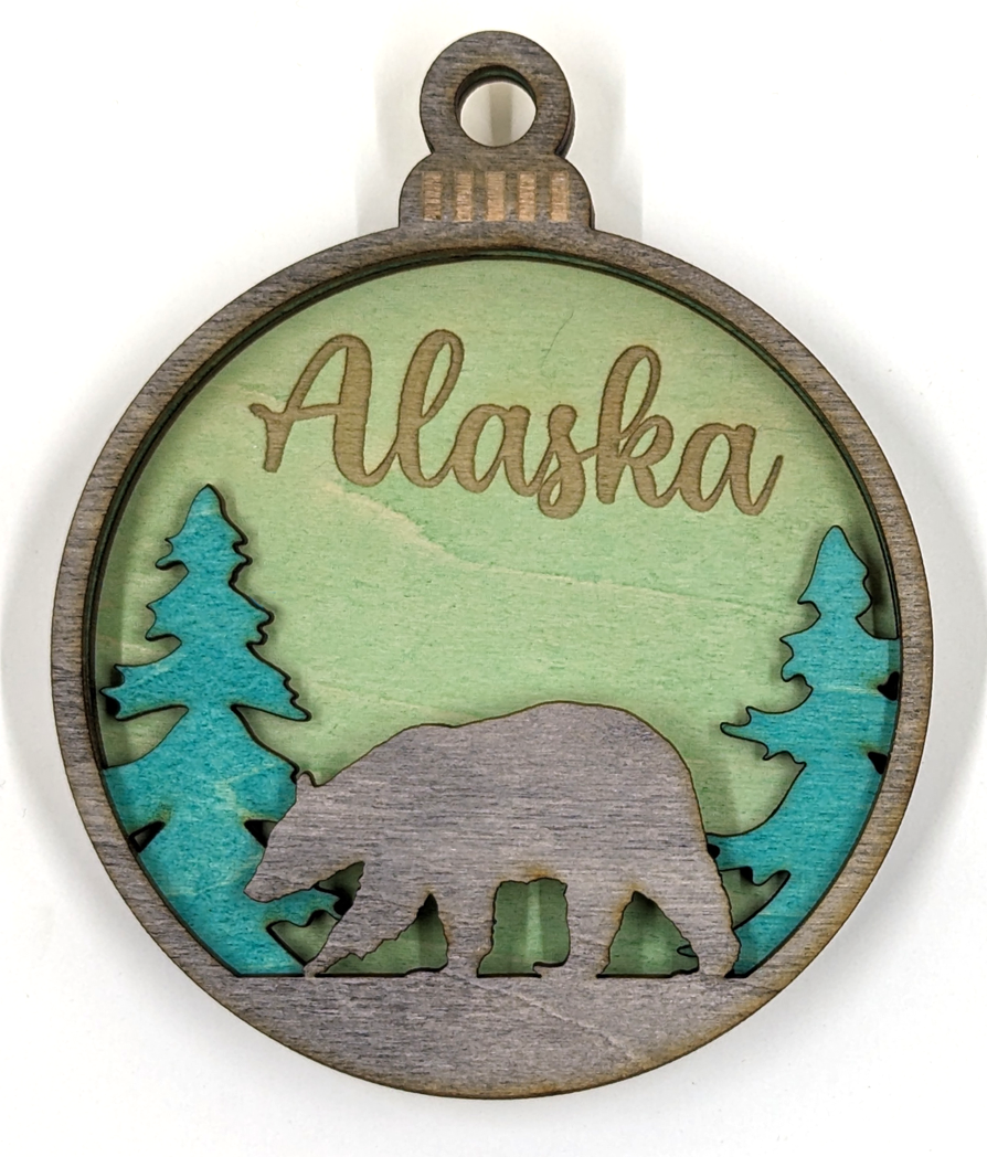 Alaska Christmas ornament, black bear with green background